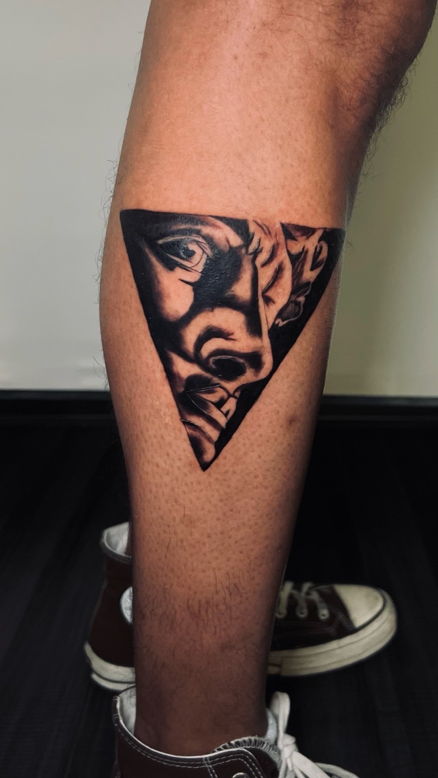 Graphic Portrait tattoo by Cam Donachie