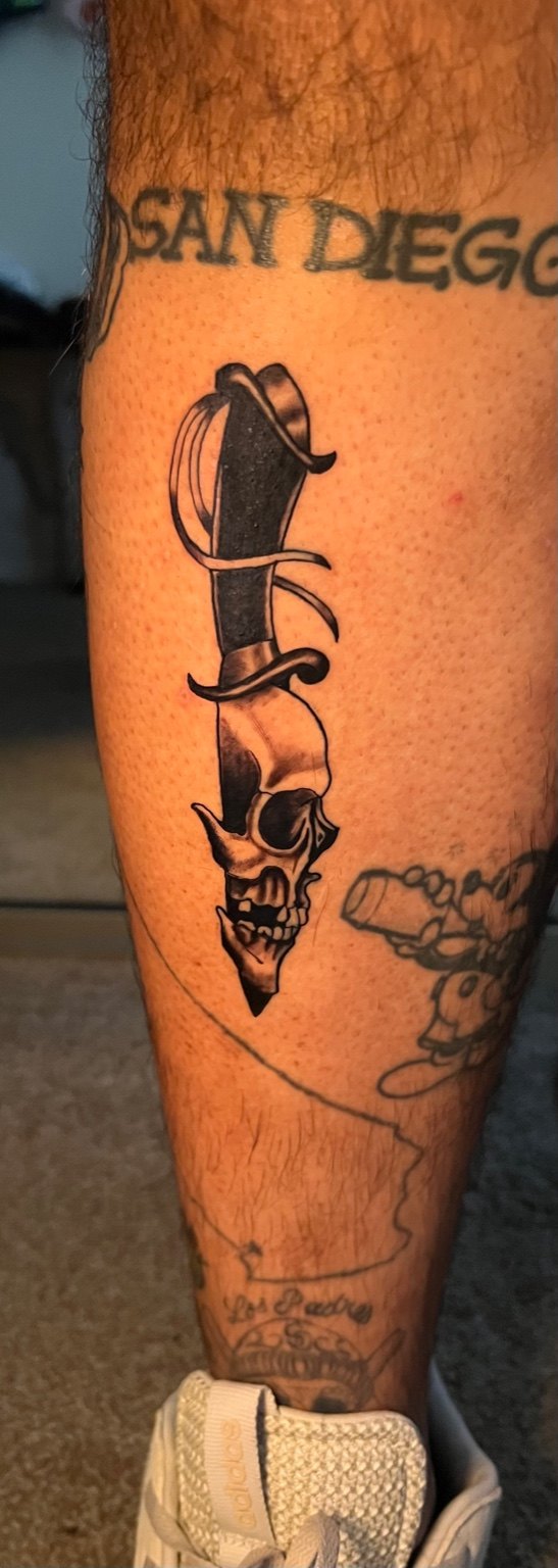 Dagger & Skull tattoo by Cam Donachie