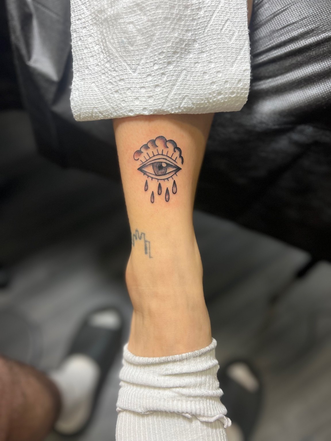 Crying Eye tattoo by Cam Donachie