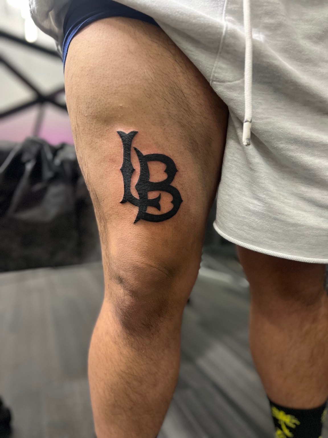 LB Monogram tattoo by Cam Donachie
